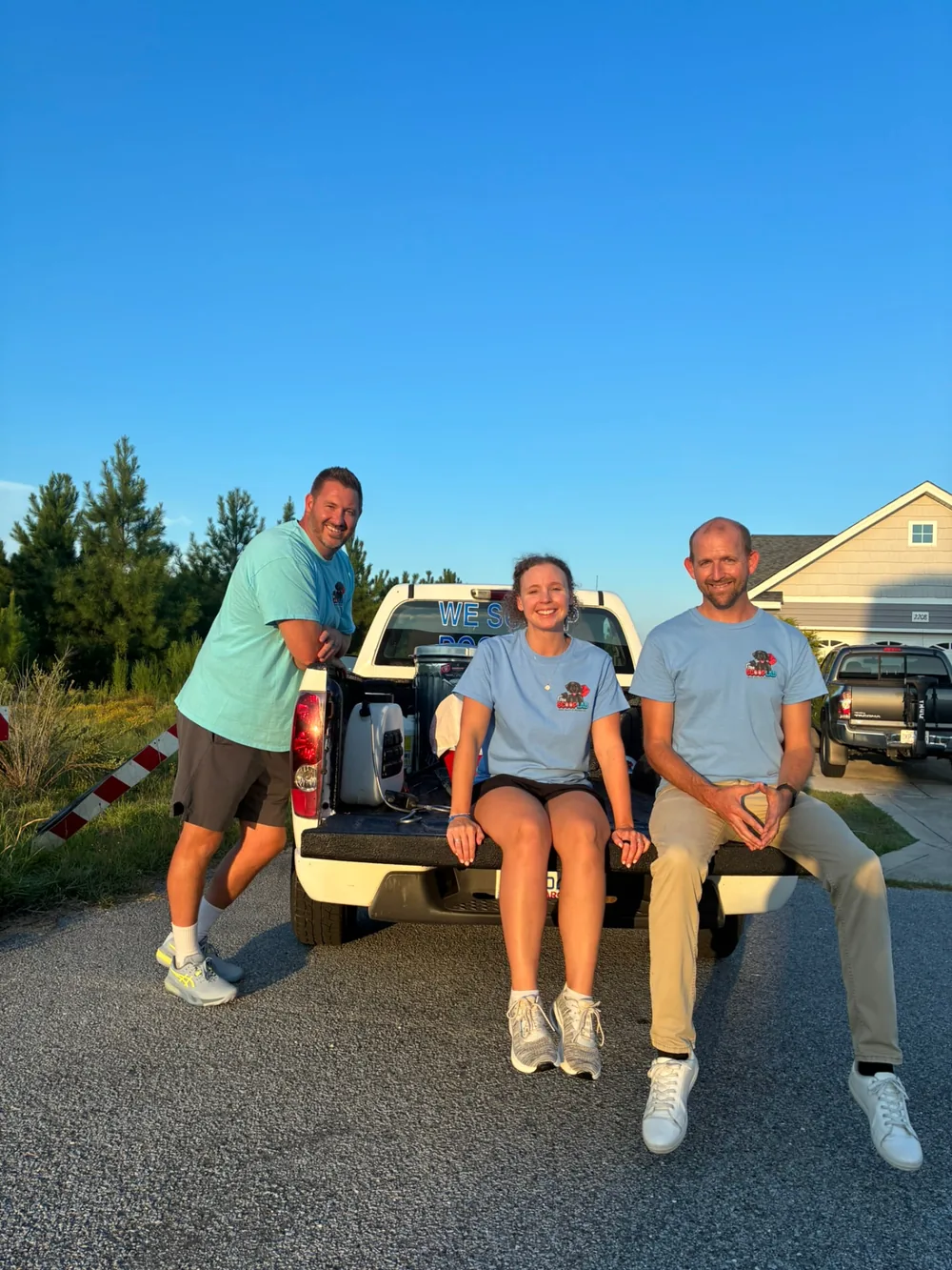 The Scoop Lab local team together at their service truck in a Pitt County neighborhood